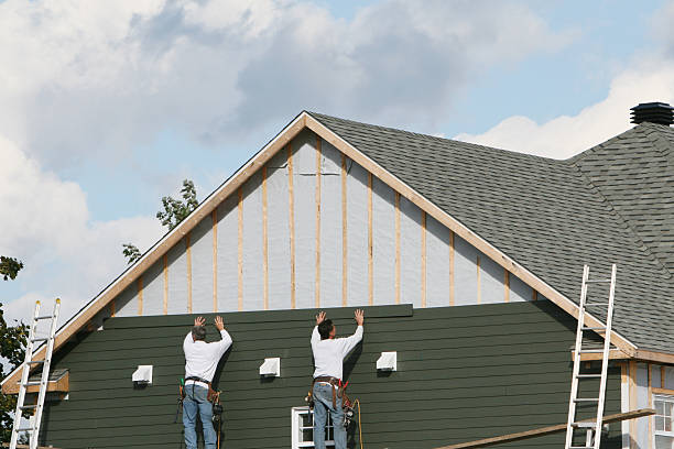 Professional Emergency Siding Repair technician working in Weston, MA